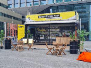 zeecontainer met branding en dakterras